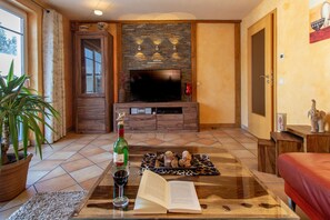 Televisie, een dvd-speler, boeken en een stereo