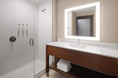 Shower, eco-friendly toiletries, hair dryer, towels