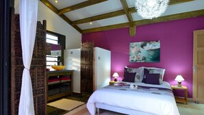 A bedroom with a bed, a nightstand, a dresser, and a large window with curtains. - Luxury villa 160 m2 with magnificent mountain view and HEATED SWIMMING POOL (Bois d'Olives)