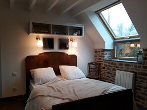 1 bedroom, desk, iron/ironing board, travel crib