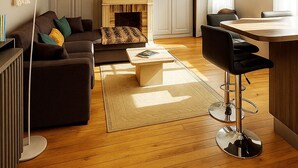A modern living room with a sofa, coffee table, and a fireplace. - Family Suite F3 Grant in the heart of Chartres has 55m2 2 bedrooms, parking (Chartres)