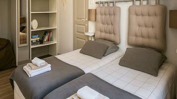2 habitaciones, tabla de planchar con plancha, wifi y ropa de cama