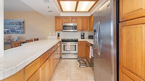 Coffee/tea maker, fridge, microwave, oven
