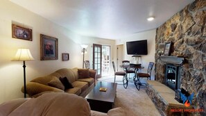 Flat-screen TV, fireplace