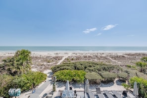 On the beach, sun loungers, beach towels