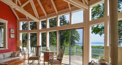 Charming waterfront 4 br gated estate on 8 acres with private beach and buoy.