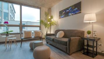 Deluxe Apartment, Multiple Beds, Non Smoking, Kitchen | Living room | 42-inch flat-screen TV with cable channels, TV