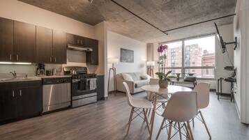 Superior Apartment, Multiple Beds, Non Smoking, Kitchen | Living room | 42-inch flat-screen TV with cable channels, TV