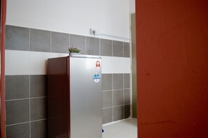Apartamento família, 3 quartos | Comodidades do quarto