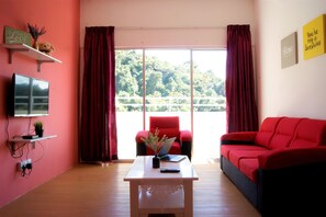Appartement familial, 3 chambres | Salle de séjour | Téléviseur ACL