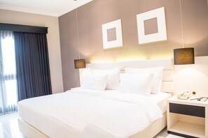 Deluxe Double or Twin Room, Non Smoking | In-room safe, desk, free WiFi, bed sheets - Luminor Hotel Jember by WH (Jember)