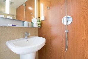 Shower, free toiletries, hair dryer, slippers