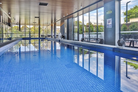 Indoor pool, open 6:00 AM to 9:00 PM, sun loungers