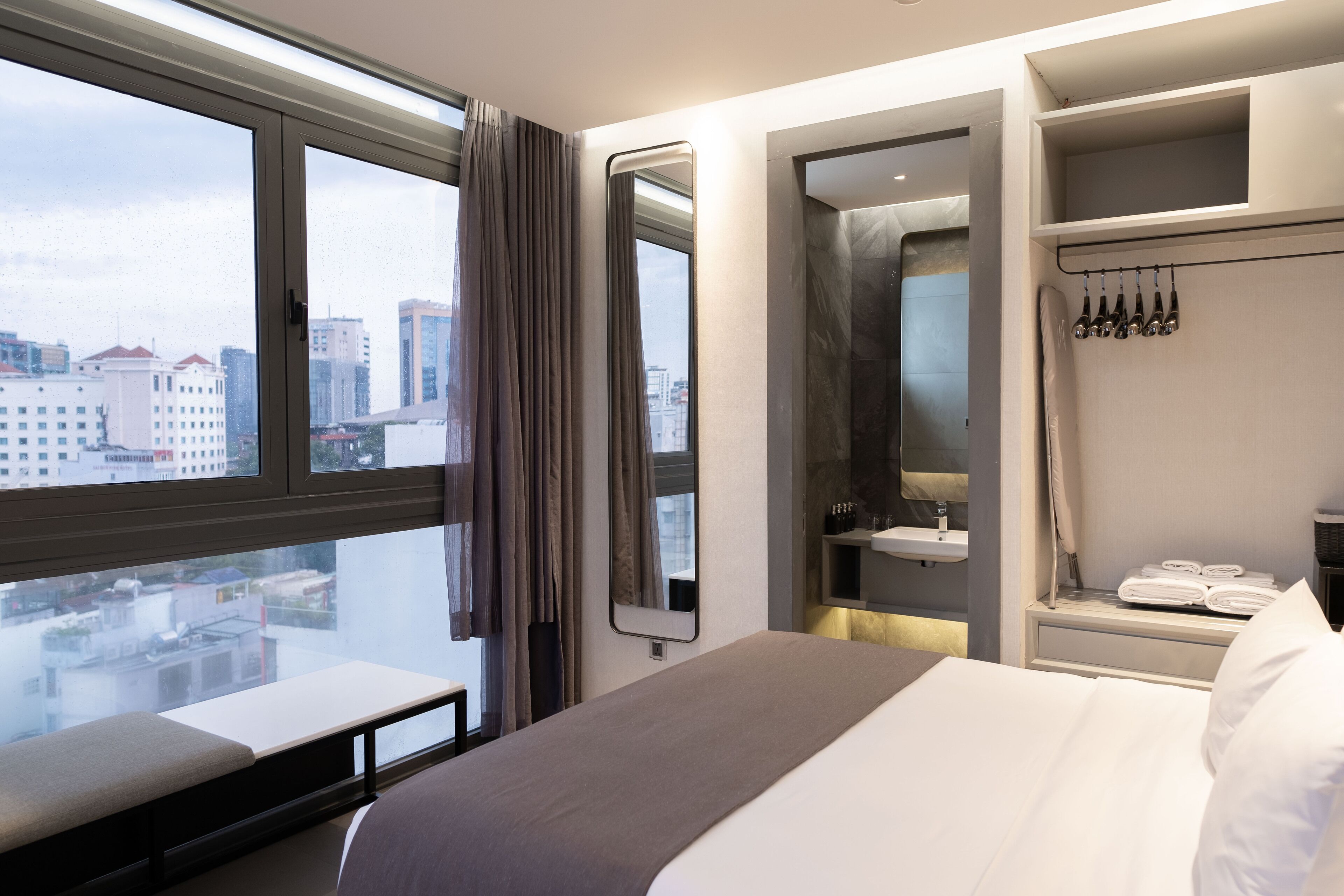 saigon corner | bathroom | designer toiletries, hair dryer, slippers, towels