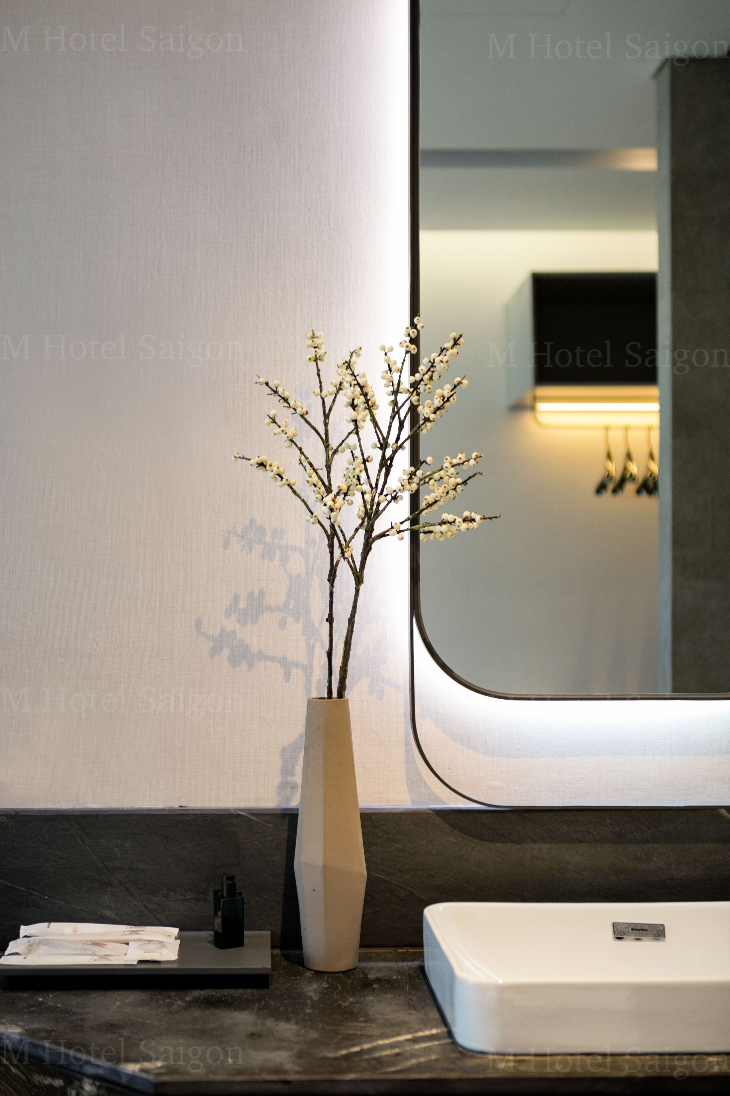 junior contemporary suite | bathroom | designer toiletries, hair dryer, slippers, towels