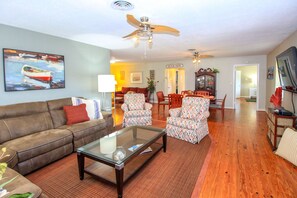 Smart TV, fireplace, books, offices