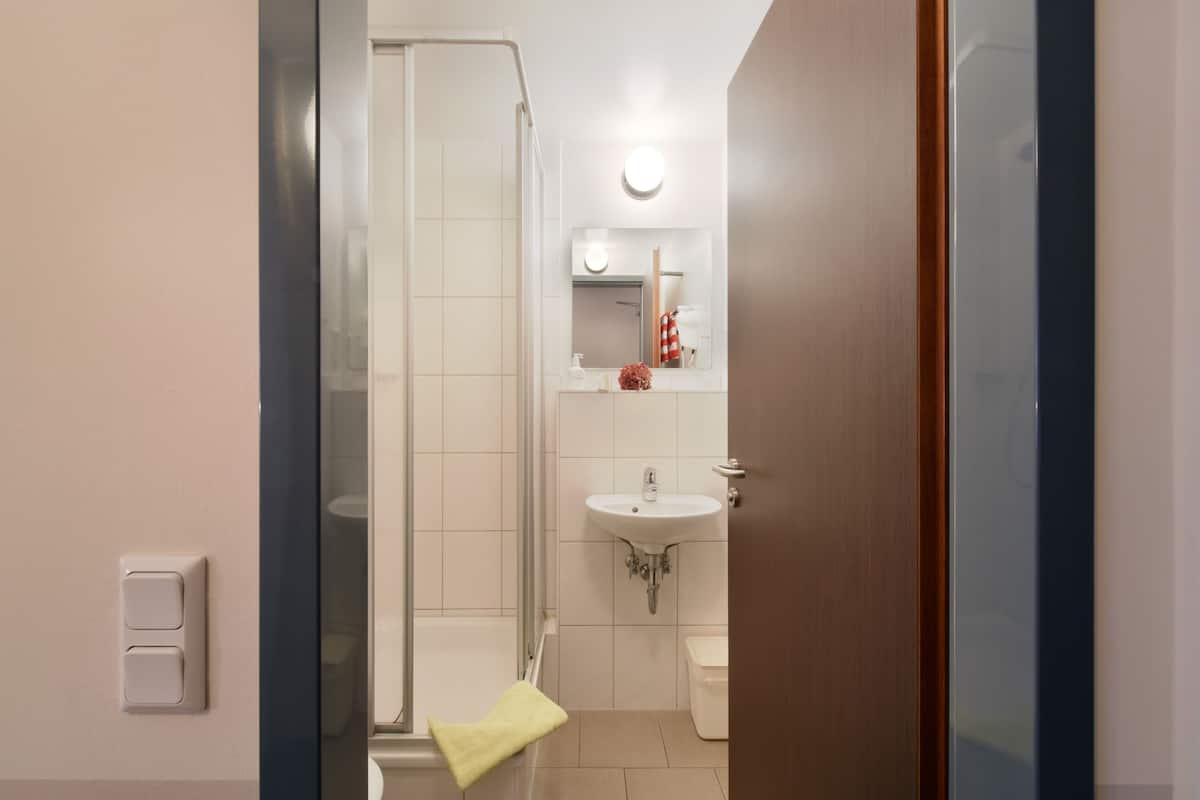 comfort single room | bathroom | shower, hair dryer, towels