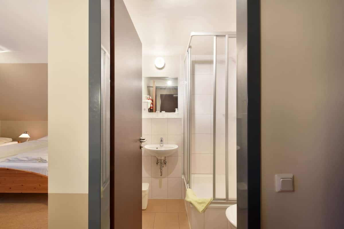 family apartment | bathroom | shower, hair dryer, towels