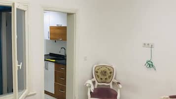 Apartment, 1 Bedroom | Living area | LCD TV