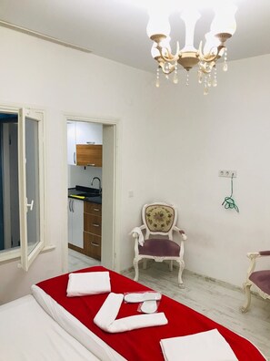 Departamento, 1 habitación | Área de sala de estar | Televisión LCD 