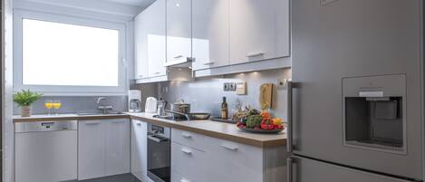 Apartment, 2 Bedrooms | Private kitchen | Full-size fridge, oven, stovetop, dishwasher