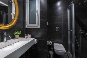 Apartment, 2 Bedrooms | Bathroom | Shower, free toiletries, hair dryer, towels