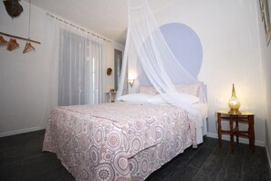 Double Room, Terrace (Mezziornu) | Minibar, in-room safe, individually decorated, individually furnished - Ajamola (Favignana)