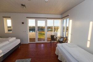Triple Room, Private Bathroom | Blackout drapes, free WiFi, bed sheets