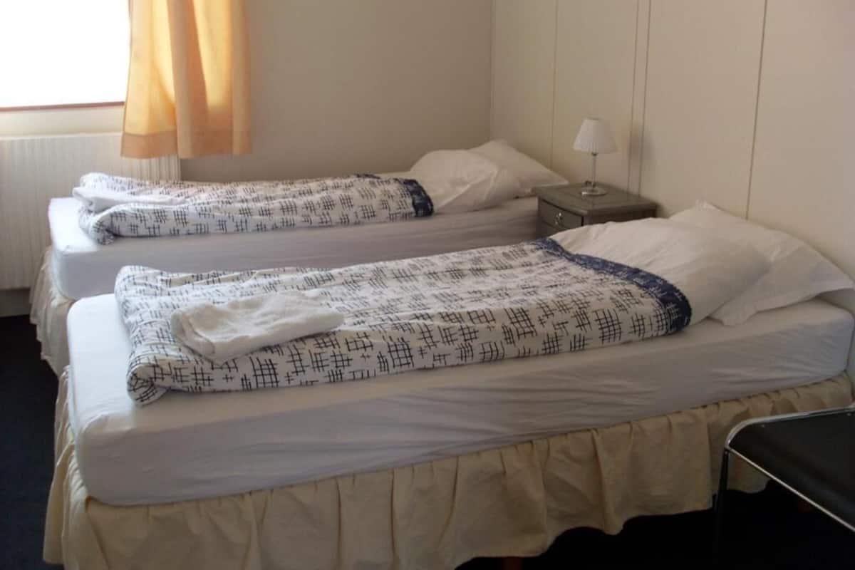 Camera singola, bagno condiviso | Tende oscuranti, Wi-Fi gratuito, lenzuola