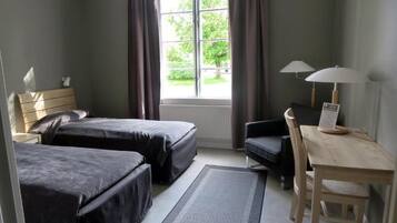 Desk, blackout curtains, free WiFi, bed sheets