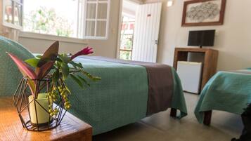 Quarto triplo | Frigobar, Wi-Fi de cortesia, roupa de cama