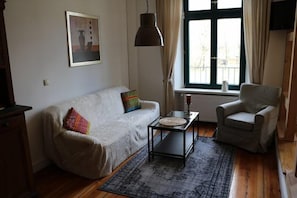 Family Apartment, 1 Bedroom (FW 4) | Living room | Flat-screen TV - Herrenhaus Alt Vorwerk (Walkendorf)