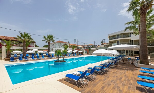 2 outdoor pools, pool umbrellas, pool loungers