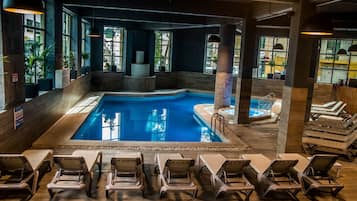 Indoor pool, outdoor pool, open 7:00 AM to 7:00 PM, pool umbrellas