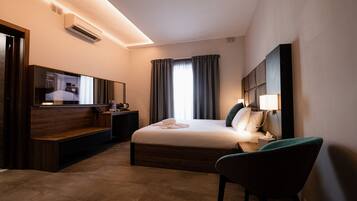 Premium bedding, memory-foam beds, in-room safe, individually decorated