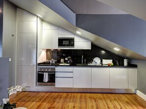 Superior Apartment, 1 Bedroom | Private kitchen | Full-sized fridge, microwave, oven, stovetop - Canaan Boutique Apartments Fanqueiros114 (Lisbon)