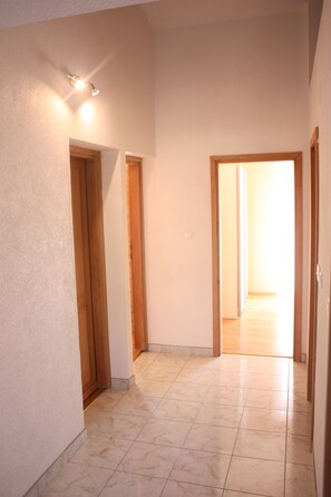 Apartment, 3 Bedrooms | Desk, soundproofing, iron/ironing board, free WiFi