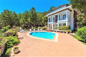 Outdoor pool, pool umbrellas, pool loungers