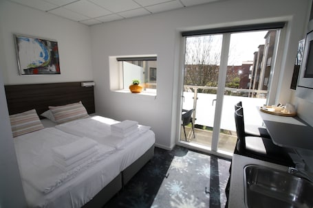 Double Room, Balcony | 1 bedroom, blackout drapes, soundproofing, iron/ironing board