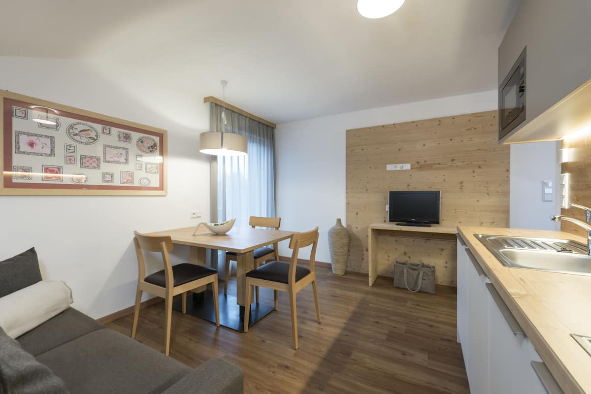 Superior Apartment, 1 Bedroom | Frette Italian sheets, down comforters, in-room safe, soundproofing