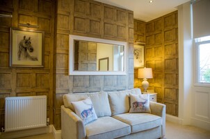 Apartment, 2 Bedrooms (The Lodge) | Living room | 28-inch LED TV with digital channels, TV