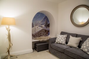 Apartment, 1 Bedroom (The Chalet) | Living room | 28-inch LED TV with digital channels, TV