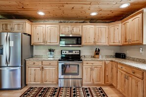 Fridge, microwave, oven, stovetop - Lakefront home with private dock, firepit, playground & lake views (Eagle River)