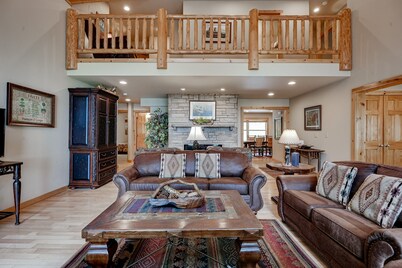 Lakefront home with private dock, firepit, playground & lake views