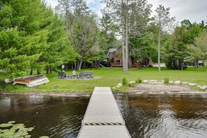 Property grounds - Lakefront home with private dock, firepit, playground & lake views (Eagle River)