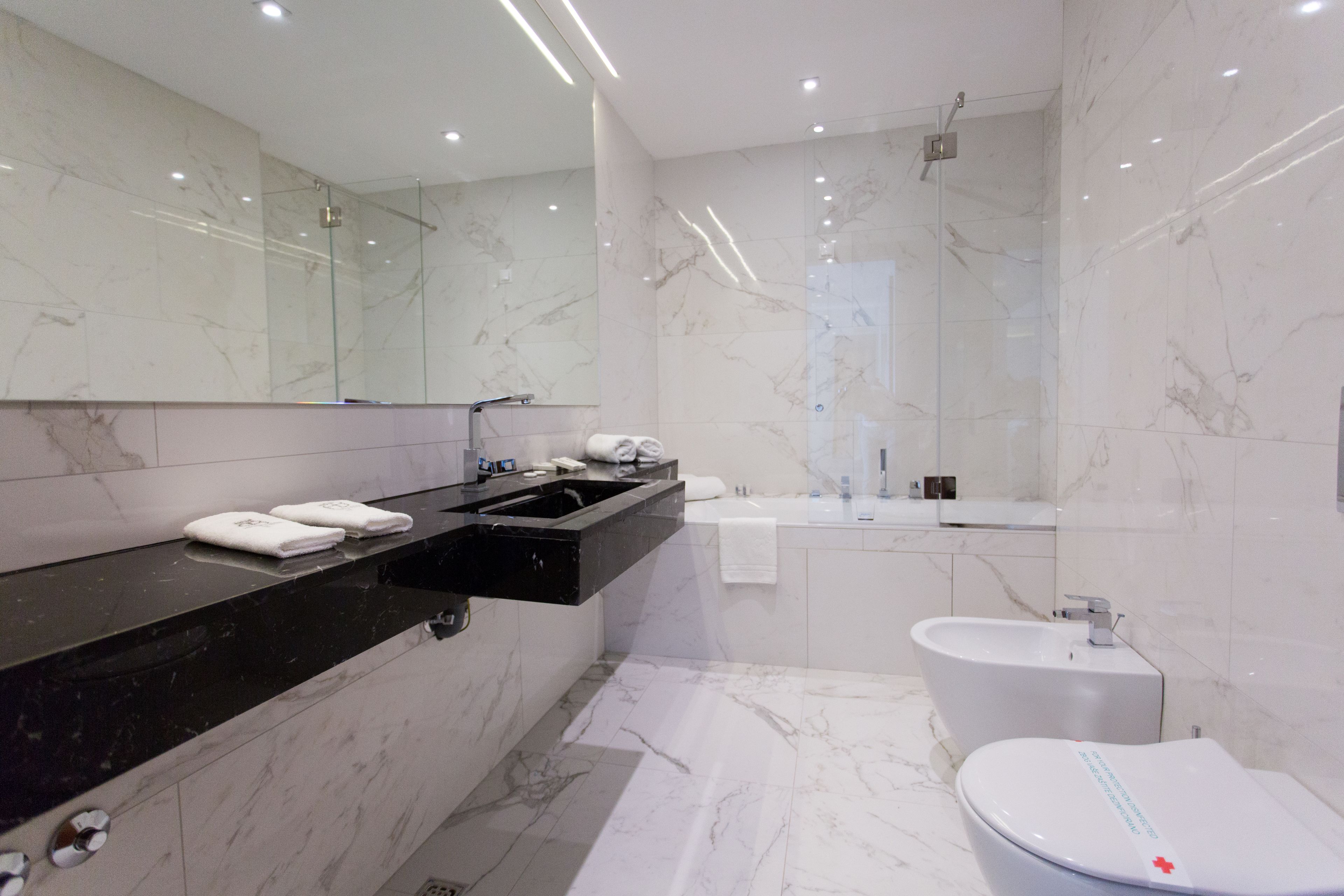 superior twin room | bathroom | free toiletries, hair dryer, bathrobes, slippers