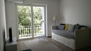 Studio, Meerblick | Wohnbereich | Flachbildfernseher