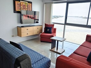 Suíte premium, 1 quarto, suíte, no piso térreo | Roupas de cama premium, edredons de pluma, camas com colchões pillow-top