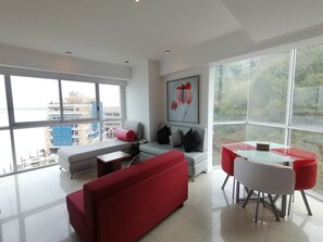 Suite Exécutive, 1 chambre, salle de bains attenante, rez-de-chaussée | Coin séjour