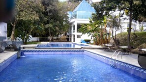 Indoor pool, 4 outdoor pools, open open 24 hours a day, pool umbrellas